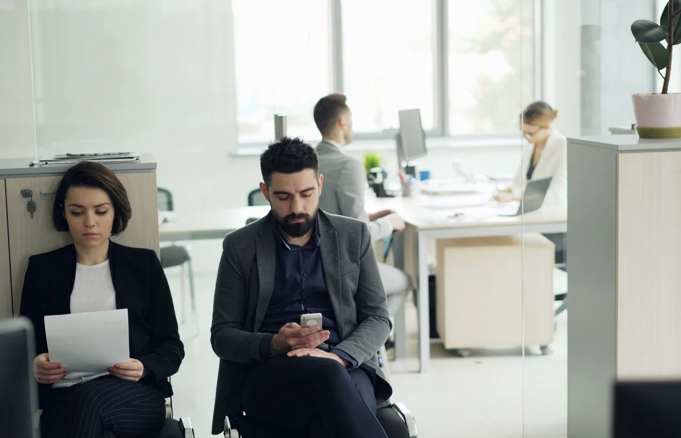Business professionals working in a modern open office